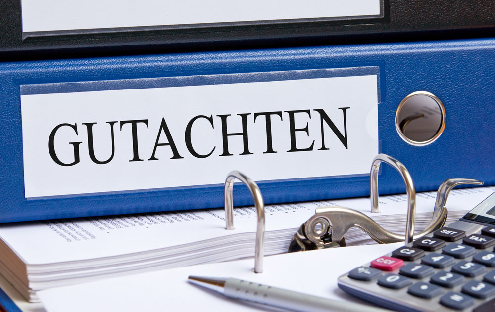 Hintergrundbild: Aktenordner mit der Aufschrift "Gutachten"